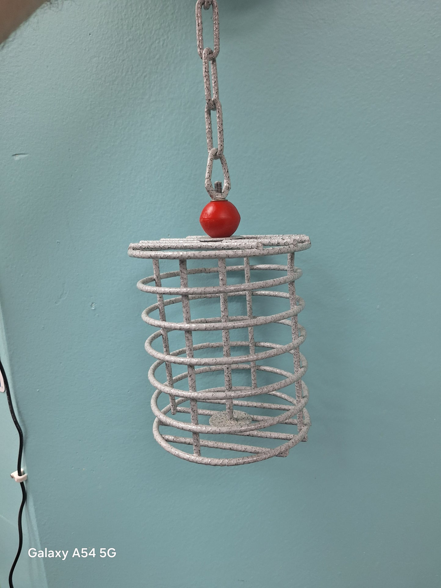 Large round bird foraging cage